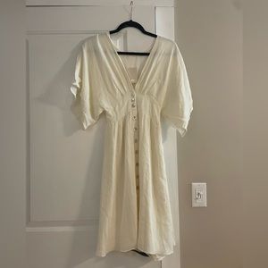 Cream beach knee length dress with buttons